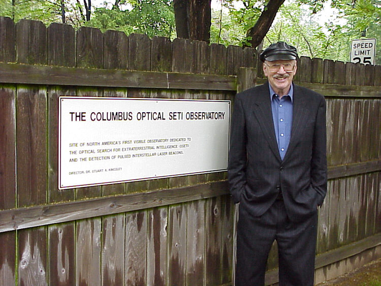 Monte Ross beside the COSETI sign