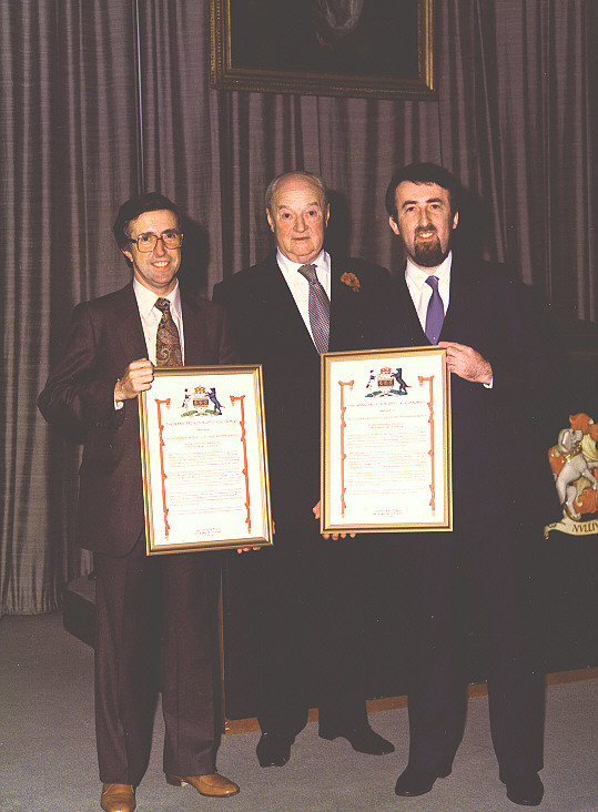 Professor D.E.N. Davies, Sir John Davis, and Dr. Stuart A. Kingsley